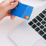 Ecommerce Shift - Person Holding Bank Card