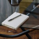 Work-life Balance - White and Silver Chair Beside Clear Drinking Glass on Glass Table