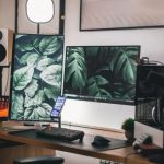 Business Setup - Black Flat Screen Computer Monitor on White Wooden Desk