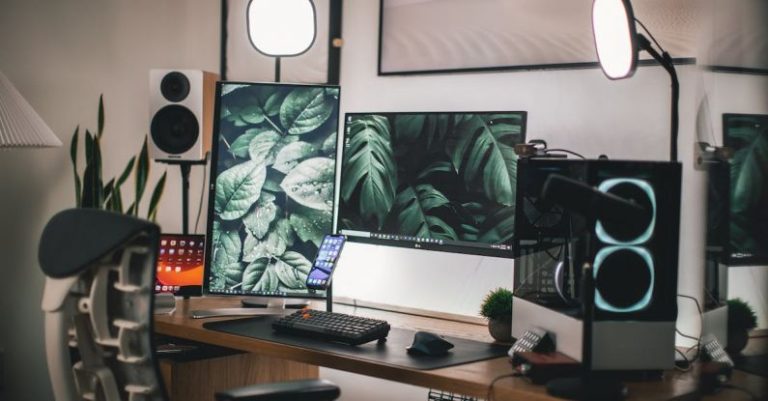 Business Setup - Black Flat Screen Computer Monitor on White Wooden Desk