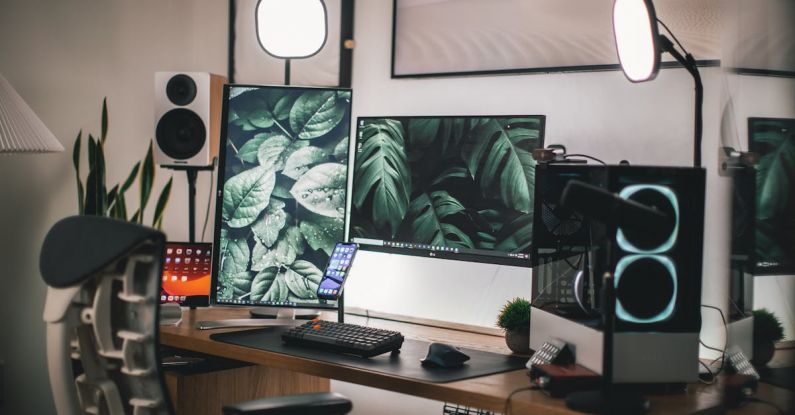 Business Setup - Black Flat Screen Computer Monitor on White Wooden Desk