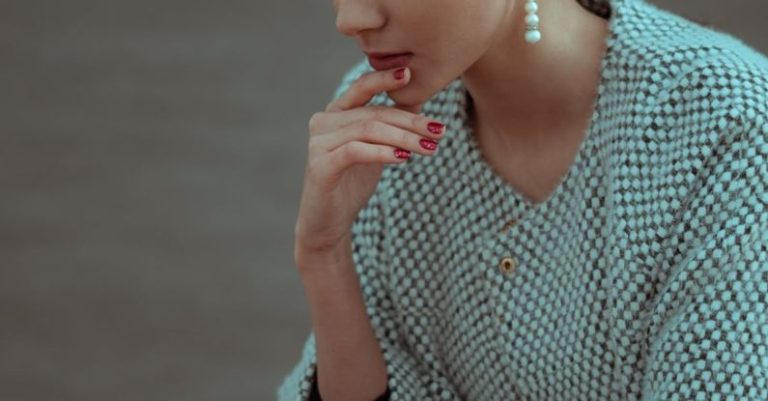 Challenges Solution - Focused woman thinking about next move and playing chess