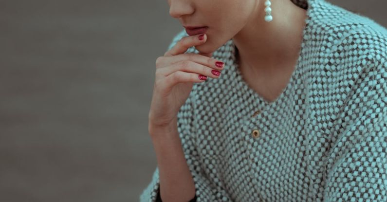 Challenges Solution - Focused woman thinking about next move and playing chess