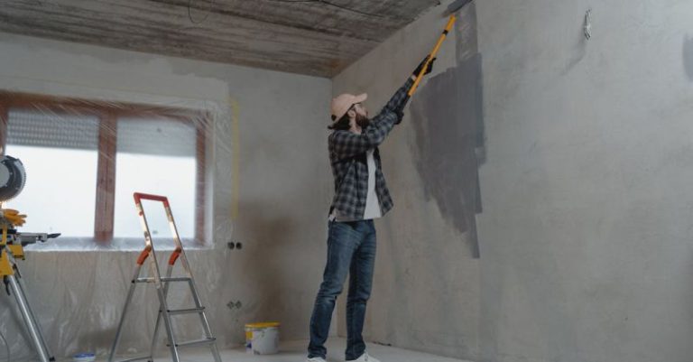 Skills Improvement - Man Painting the Wall