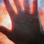 Burnout Prevention - Hand Touching Glass