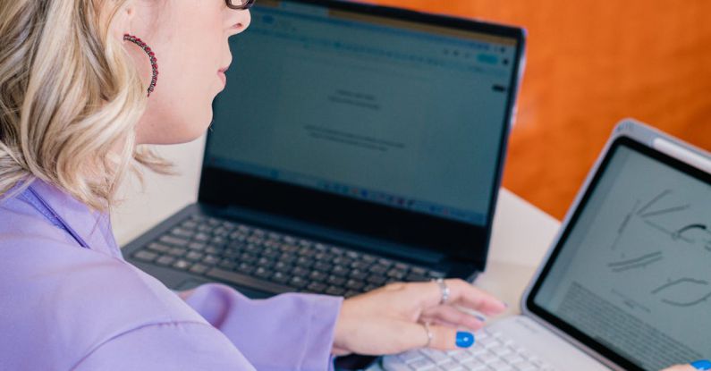 Professional Summary - A woman in a purple shirt is using a laptop