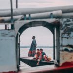 Employment Gap - A boat with a person standing on the side