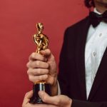 Accomplishments Trophy - An Actor Holding His Award