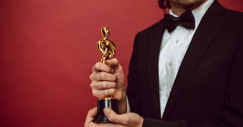Accomplishments Trophy - An Actor Holding His Award