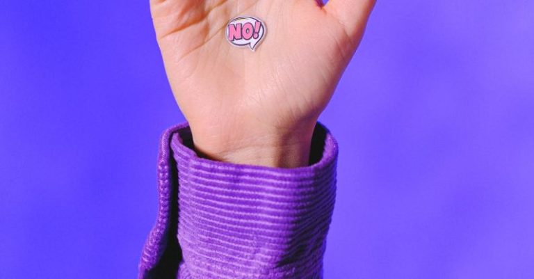 Rejection Letter - Crop faceless person showing sticker No on raised hand