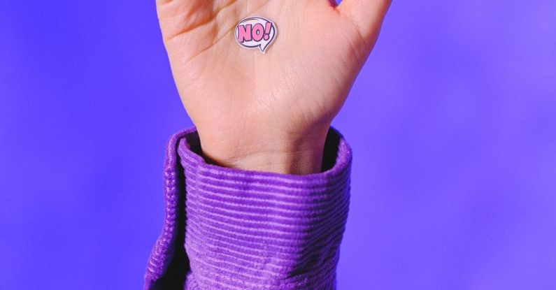 Rejection Letter - Crop faceless person showing sticker No on raised hand