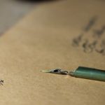 Follow-up Mail - Brown Envelop on Table