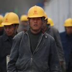 Industry Leader - Group of Persons Wearing Yellow Safety Helmet during Daytime