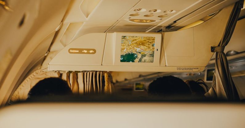 MOOCs Screen - View of Interior of an Airplane