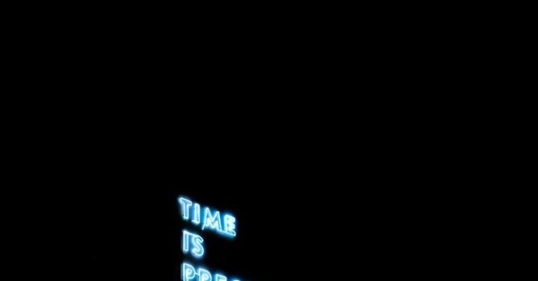 Value Maximization - Blurry Photo Of A Neon Signage