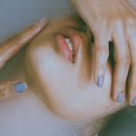 Emerging Roles - Woman Emerging from Water and Covering Her Face