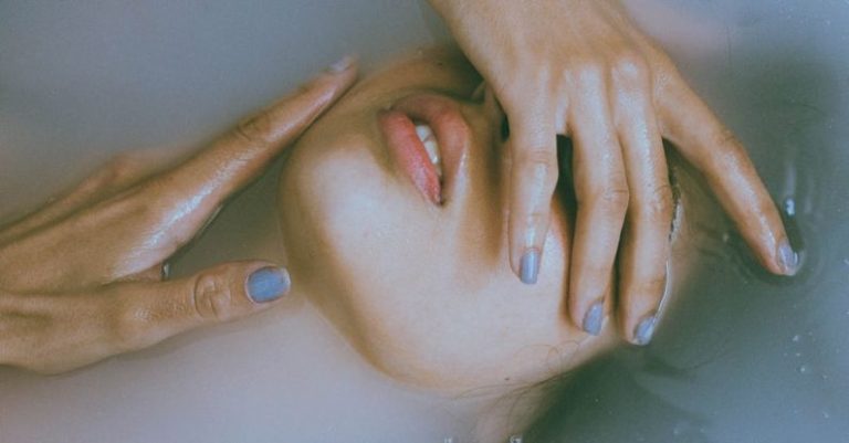 Emerging Roles - Woman Emerging from Water and Covering Her Face